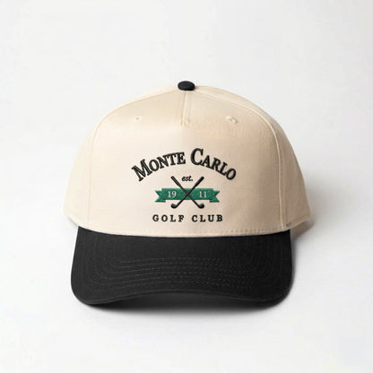 Monte Carlo Traditional golf hat in black — front view with embroidered-look crest